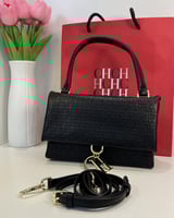 شنطة كارولينا هيريرا