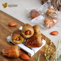 تمر سكري القصيم مفتل ملكي باللوز مغلف