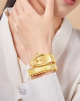 ساعة نسائية بمينا ذهبي وتصميم كوبرا ستانلس ستيل -...