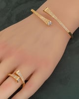 طقم اسوارة وخاتم ذهبي مزين بالزركون بتصصميم سبمل ا...