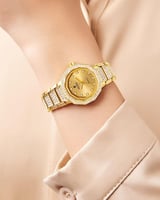 ساعة يد ذهبية مزينة بالزركون