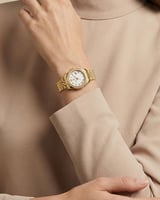 ساعة نسائية من خاتون بتصميم سويسري لون ذهبي ابيض