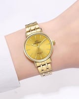 ساعة نسائية لون ذهبي مينا ذهبي داكن