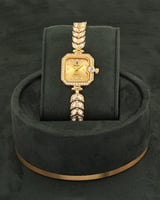 طقم ذهبي راقي مرصع بالزركون مع ساعة فخمة