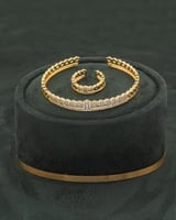 طقم اسوارة وخاتم مرصع بفصوص الزركون اللامع