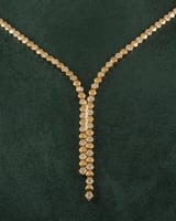 طقم مجوهرات ذهبي راقٍ بحبات زركون