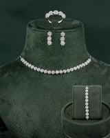 طقم فضي أنيق مرصع بالزركون مع ساعة يد مميزة