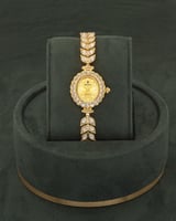 طقم ذهبي راقي مرصع بالزركون مع ساعة فخمة