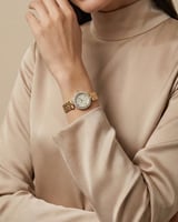 ساعة ذهبية من خاتون® تصميم كلاسيكي بإطار ماسي