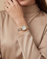 ساعة أصلية من خاتون تصميم ذهبي فضي فاخر بلمعة الأل...