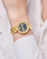 ساعة يد ذهبية للنساء بإطار مزخرف بالزركون ومينا رم...