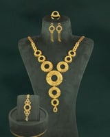 طقم مجوهرات دائري انيق بلمعة الذهب الاصفر