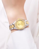 ساعة نسائية ذهبية مزينة بالزركون حزام فضي ذهبي