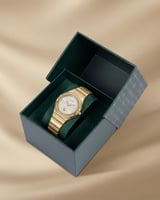 ساعة نسائية راقية من خاتون لون ذهبي مينا أبيض