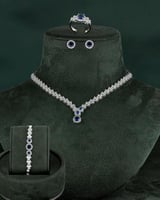 طقم مجوهرات مزين بالزركون الأزرق بلمعة الألماس