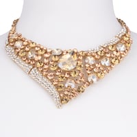 طقم طوق وحلق بريق الذهب مزين بالكريستالات الناعمة