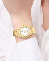 ساعة يد نسائية لون ذهبي فاخر مزينة بالزركون مينا أ...