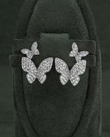 حلق الفراشة الفضي بلمعة الألماس