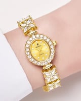 ساعة ستيل مزخرفة بالزركون تصميم ذهبي للنساء