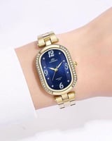 ساعة نسائية لون ذهبي مينا كحلي