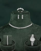 طقم فضي أنيق مرصع بالزركون مع ساعة يد مميزة