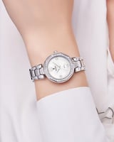 ساعة يد فضية للنساء بإطار مزخرف بالزركون