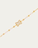 إسوارة نسائية ناعمة تصميم ذهبي مع حلية على شكل X