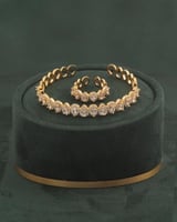 سوار وخاتم تصميم ندى الماس لون ذهبي