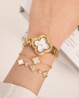 طقم ساعة وأساور فاخرة بلون ذهبي و تصميم عالمي مرصّ...