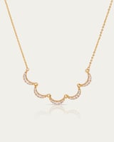 سلسال نسائي ذهبي بتصميم الأهلة المتلألئة مرصع بالز...