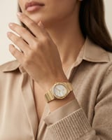 ساعة نسائية راقية من خاتون لون ذهبي مينا أبيض