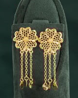 طقم مجوهرات زهور الأقحوان لإطلالة ملكية بلمعة الذه...