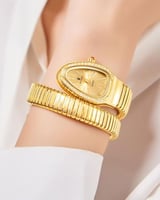 ساعة نسائية بمينا ذهبي وتصميم كوبرا ستانلس ستيل -...