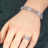 طقم اسوارة وخاتم بلمعة الألماس مزين بالزركون من خا...