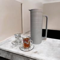 ترامس ارينا شاي و قهوه بعدة اللوان