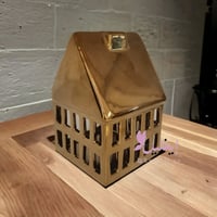 شمعدان سراميك بيت ذهبي لامع