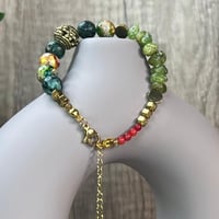 إسوارة اليشم الأخضر والزبرجد – توازن الروح وحيوية...