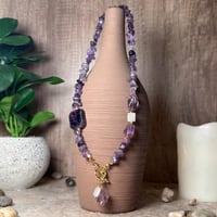 قلادة أماثيست مع كات آي – صفاء، حماية، وتوازن داخل...