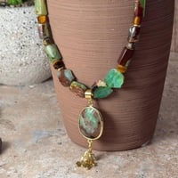 قلادة عين النمر والكريسوبراسي – قوة، توازن، وطاقة...