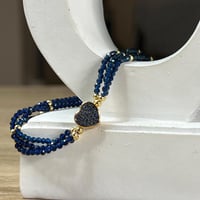 أسورة الزفير مع قلب في المنتصف – حبٌ ملكي ولمسة من...