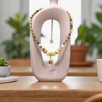 قلادة عين النمر مع الهيماتيت والجاسبر – قوة الأرض...