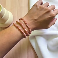 ثلاثة أساور مطاطية من حجر الرودونايت