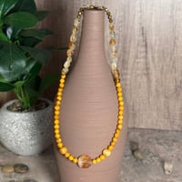 قلادة الكهرمان والسترين مع الهيماتيت وعين النمر –...