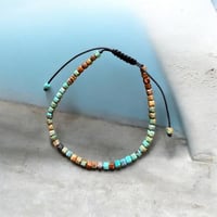 إسوارة الفيروز الطبيعي – بساطة راقية بروح طبيعية ص...