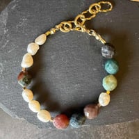 أسوارة حجر عقيق موسى واللؤلؤ الطبيعي – توازن الأرض...