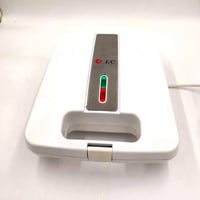 صانعة الجوزية الكهربائية 24 خانة 1400 واط