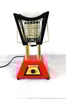 دفاية كهربائية على شكل مبخرة