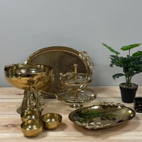 تبسي معدن ذهبي هندي شيك بغصن شجرة على طرفي التبسي