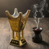 مبخرة خشبي ستيل بلونين ذهبي وفضي.