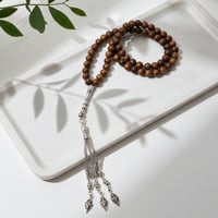 سبحة من خشب العود الطبيعي 99 خرزة معتقة بدهن العود